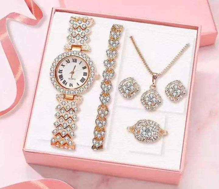 Elegante set de joyeria de Fantasia fina:Reloj y 4piezas.